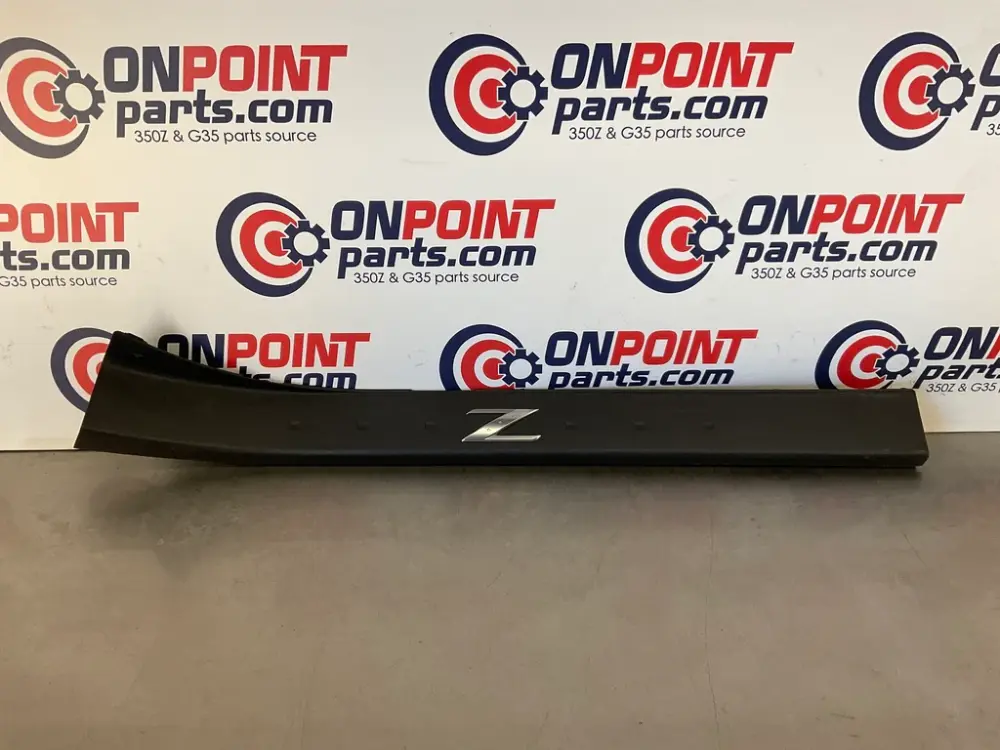 2006 Nissan 350Z Passenger Right Door Kick Plate Trim 769B0 OEM 21BJFD7
