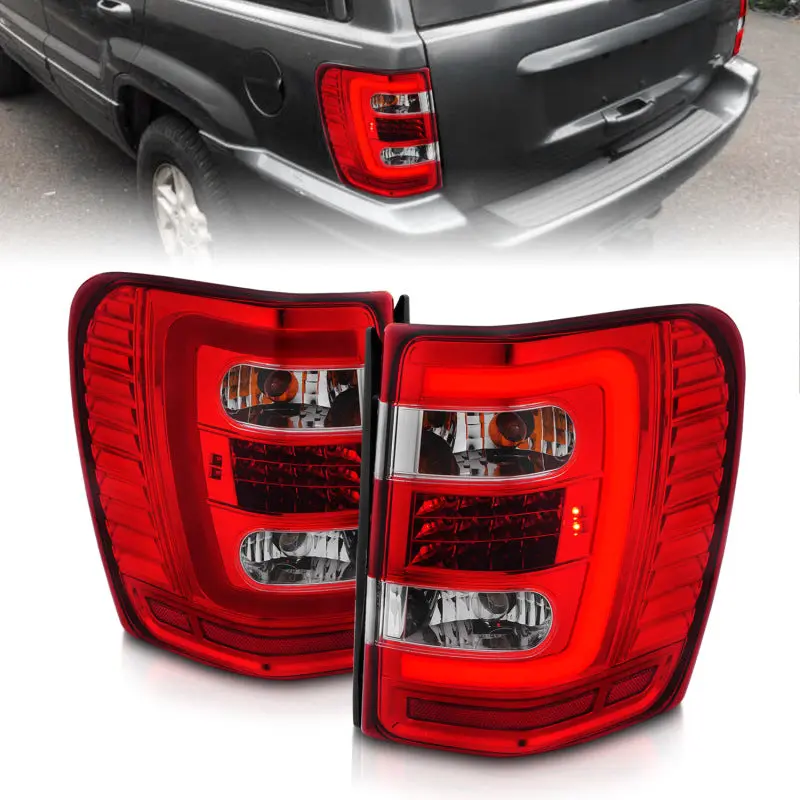 ANZO 1999 2004 Jeep Grand Cherokee LED Tail Lights w Light Bar Chrome Housing Red Clear Lens