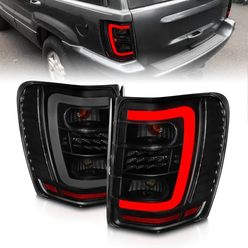 ANZO 1999 2004 Jeep Grand Cherokee LED Tail Lights w Light Bar Black Housing Smoke Lens