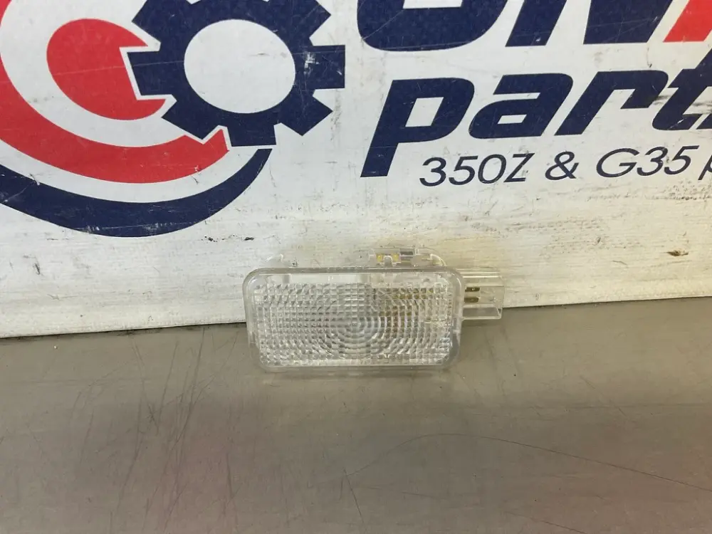 2012 Nissan 370Z Trunk Illumination Airy Lens 26490 OEM 24BDMEE